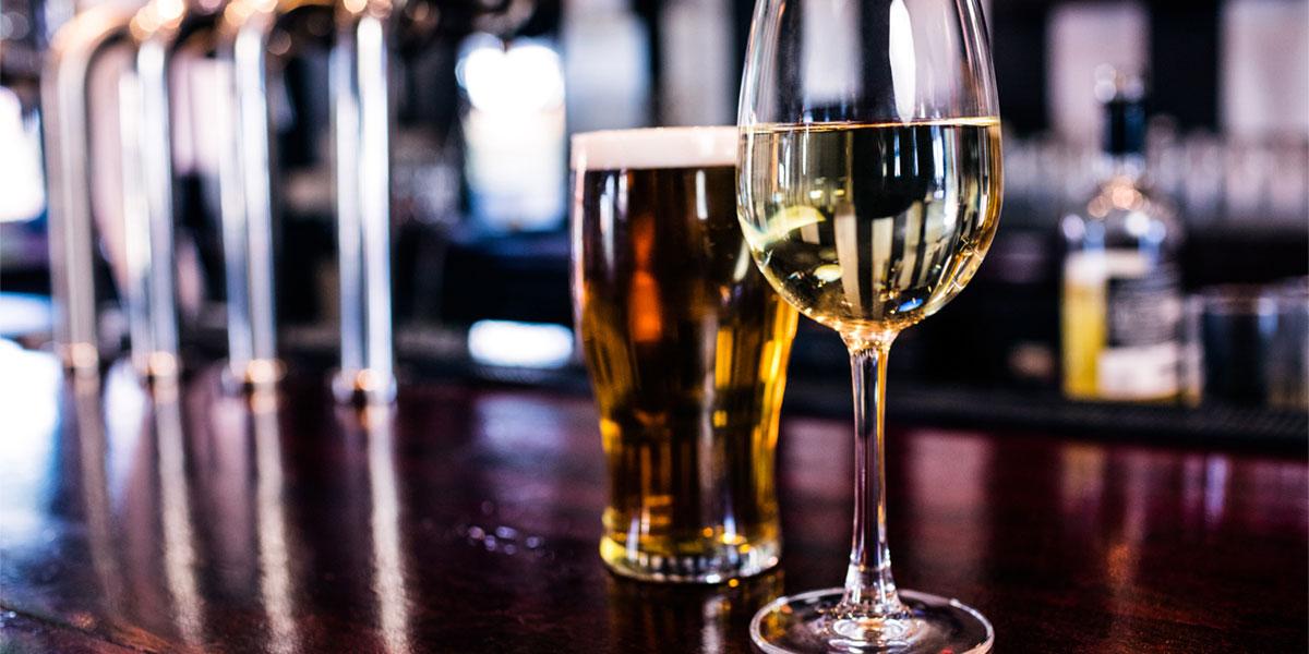 wine and beer glasses in restaurant setting